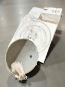 A contemporary mirror in box, together with an IKEA Arstid ceiling light and a further LED light.