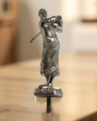 A chrome Desmo car mascot in the form of a golfer, height 15 cm.