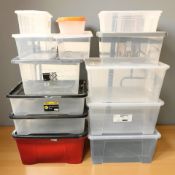A quantity of plastic storage boxes with lids, the largest 60 cm wide.