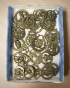 A collection of horse brasses.