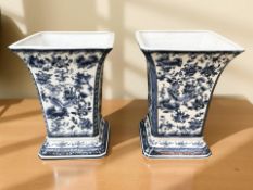 A pair of contemporary blue and white crackle glazed planters,
