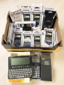A group of calculators including Casio and Psion, two related manuals.