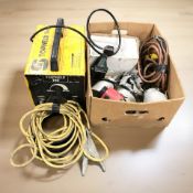 A Topweld 140 welder and a box of goggles, three spray guns, a further unused spray gun.