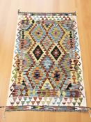 A Chobi Kilim rug, 160 cm x 104 cm.