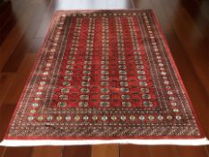 A Lahore Bokhara carpet, Pakistan, 315 cm x 220 cm.