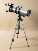 A Far Vision telescope on tripod.