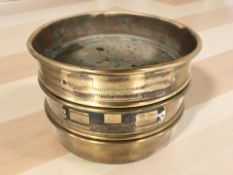 Three Endecotts brass test sieves, diameter 22 cm.