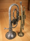 A brass trumpet signed 'Cadet', distributed by Selmer, London,