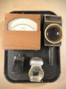 A GEC volt meter, a carriage lamp, a P&H Limited Birmingham Demon King lamp,