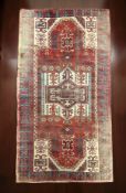A Kazak prayer rug, South Caucasus, 207cm by 100cm CONDITION REPORT: Faded.