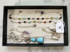 A group of silver/white metal gem-set jewellery to include pendants,