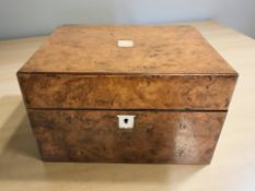 A Victorian burr walnut travelling vanity set with contents