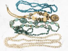 A group of pearl, turquoise and other jewellery items.
