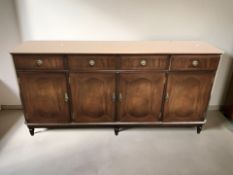 A reproduction inlaid mahogany four door sideboard, 174 cm x 44 cm x 85 cm.