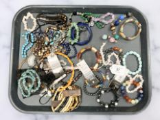 Assorted costume jewellery including hardstone bracelets, necklaces,