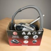 A hoover vacuum cleaner.