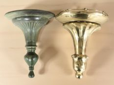 A brass wall bracket, height 26 cm, plus another similar.