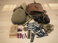 A pair of W Watson & Sons Limited military field glasses dated 1917,