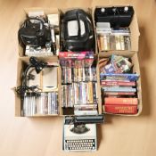A quantity of DVDs, vintage typewriter, stereos, books, etc.