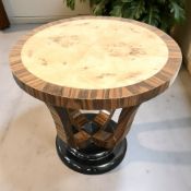 An Art Deco ebonised and burr walnut veneered circular occasional table, diameter 60 cm,