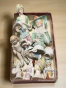 A group of antique porcelain half dolls, a small jointed bisque doll, etc.