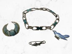 A white metal link bracelet with enamel decoration together with three brooches decorated with