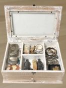 A wooden jewellery box containing assorted costume jewellery, an antique silver bangle,
