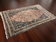 A Kashgai carpet, 315 cm x 210 cm.