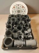 A collection of 19th century pewter tankards and an Indian pietra dura circular platter (one box)