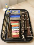 A three piece clarinet, several recorders, a small xylophone, Hohner and Echo harmonicas,