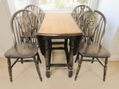 A reproduction oak gateleg extending oval dining table, overall 150 cm x 107 cm x 75 cm,