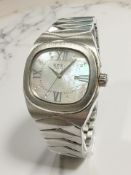 A stainless steel Breil Milan wristwatch, with mother of pearl and diamond set dial.