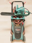 A Bosch electric lawnmower and a chainsaw.