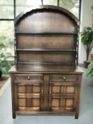A reproduction oak Dutch dresser, 123 cm x 47 cm x 189 cm.