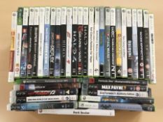 A collection of Xbox 360 and PS3 games (1 box)