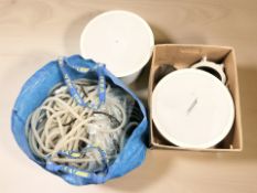 A pair of Bose Freespace 3 Series II Acoustimass module and a rope light