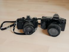 A Pentax MV1 35mm film camera with Auto Optomax 1:2.