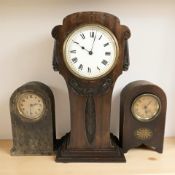 An Art Nouveau mahogany mantel clock, height 28 cm, and two further clocks.