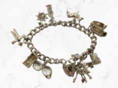 A silver charm bracelet. CONDITION REPORT: 41.