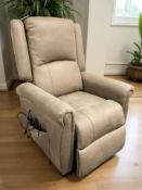 An electric reclining armchair in suede-type fabric.
