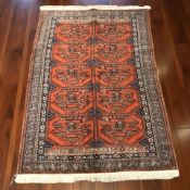 An Iranian rug, 200 cm x 133 cm.