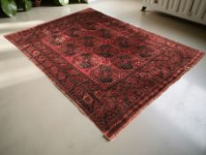 A Turkoman carpet, Afghanistan, 335 cm x 225 cm.