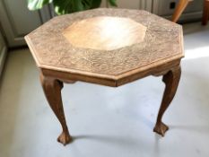 An Indian carved hardwood octagonal coffee table, width 67 cm.
