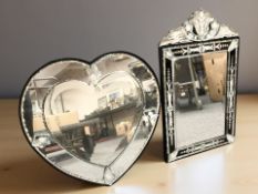 A Venetian style bevelled glass easel mirror, height 50 cm, and a similar heart shaped mirror.