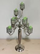 An ornate contemporary chrome ten branch candle stand, height 67 cm.