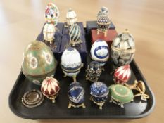 A group of contemporary decorative 'jewelled' egg ornaments, some boxed.