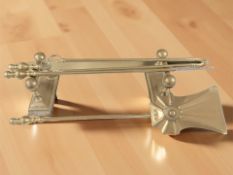 A pair of Victorian brass fire dogs and similar companion set.