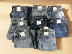 Eight pairs of M&S lady's denim jeans in various sizes, with retail tags.