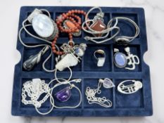 A group of silver/white metal jewellery, including amethyst, carnelian,