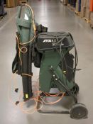 A Atco garden shredder and a leaf blower